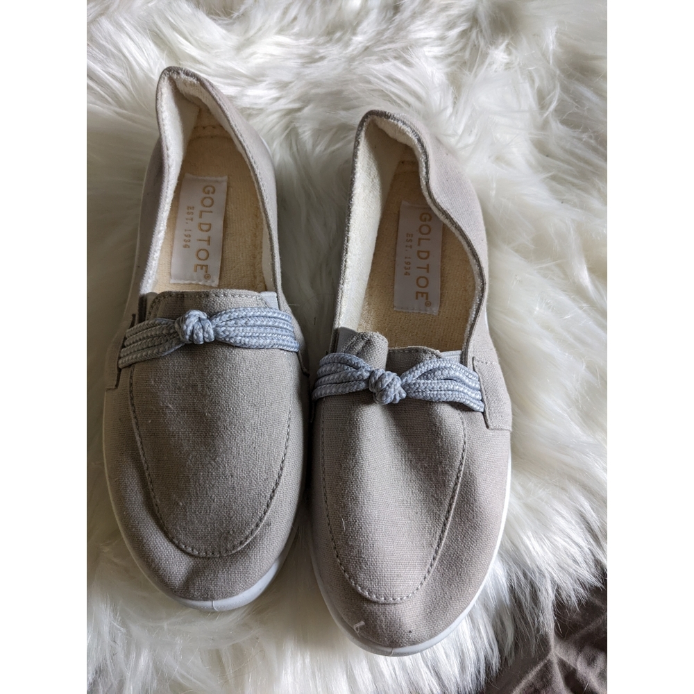 Tan cream slip on shoes by gold toe